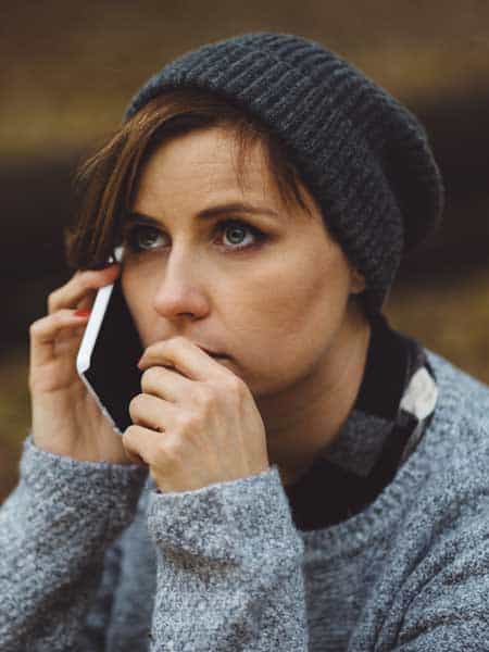 white female phone depressed